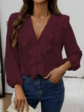 Long-sleeved blouse with a V-neck