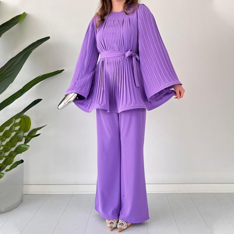 Two-piece suit made of pleated fabric