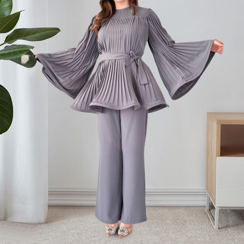 Two-piece suit made of pleated fabric